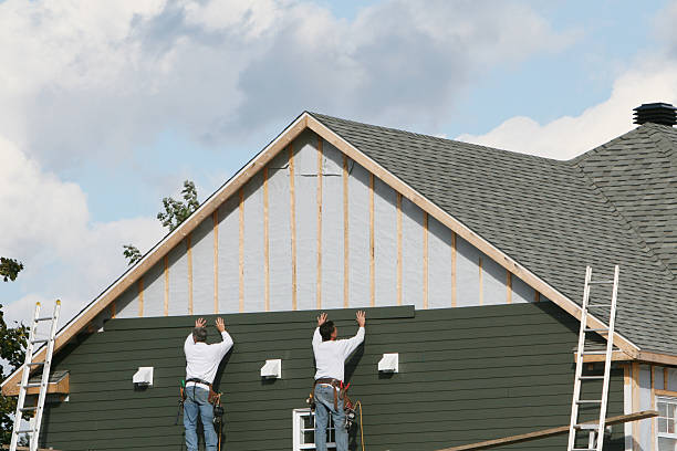 Professional Emergency Siding Repair technician working in Enfield, CT